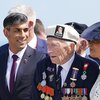 D-Day Gedenkzeremonie: Rishi Sunak entschëllegt sech fir fréizäitegt Verloossen | © picture alliance / Photoshot