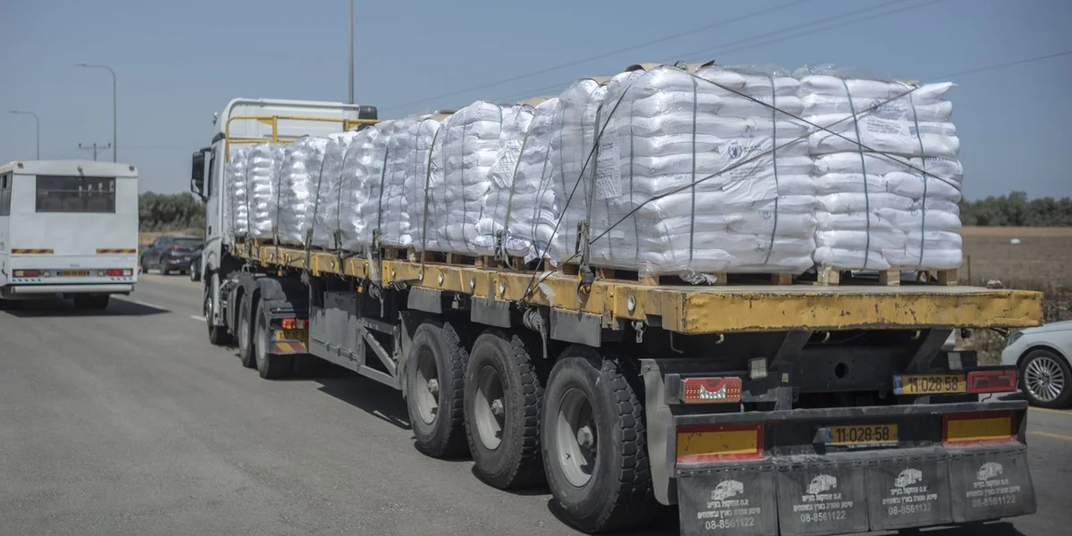 100 Camione goufen an d'Gazasträif eragelooss | © picture alliance/dpa | ILIA YEFIMOVICH