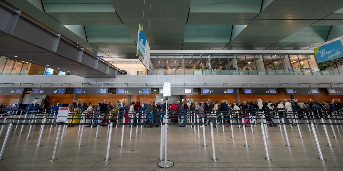 No Testphas mat Succes: Check-In a Sécherheetskontrollen um Findel viru 4 Auer moies | © picture alliance/dpa | Harald Tittel