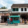 Postkaart aus Laos vum Guy Helminger (1) Räisbauer | © Bigstock
