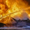 Op d'mannst 15 Leit stierwe bei massive russeschen Ugrëff an der Ukrain | © EPA/SERGEY DOLZHENKO